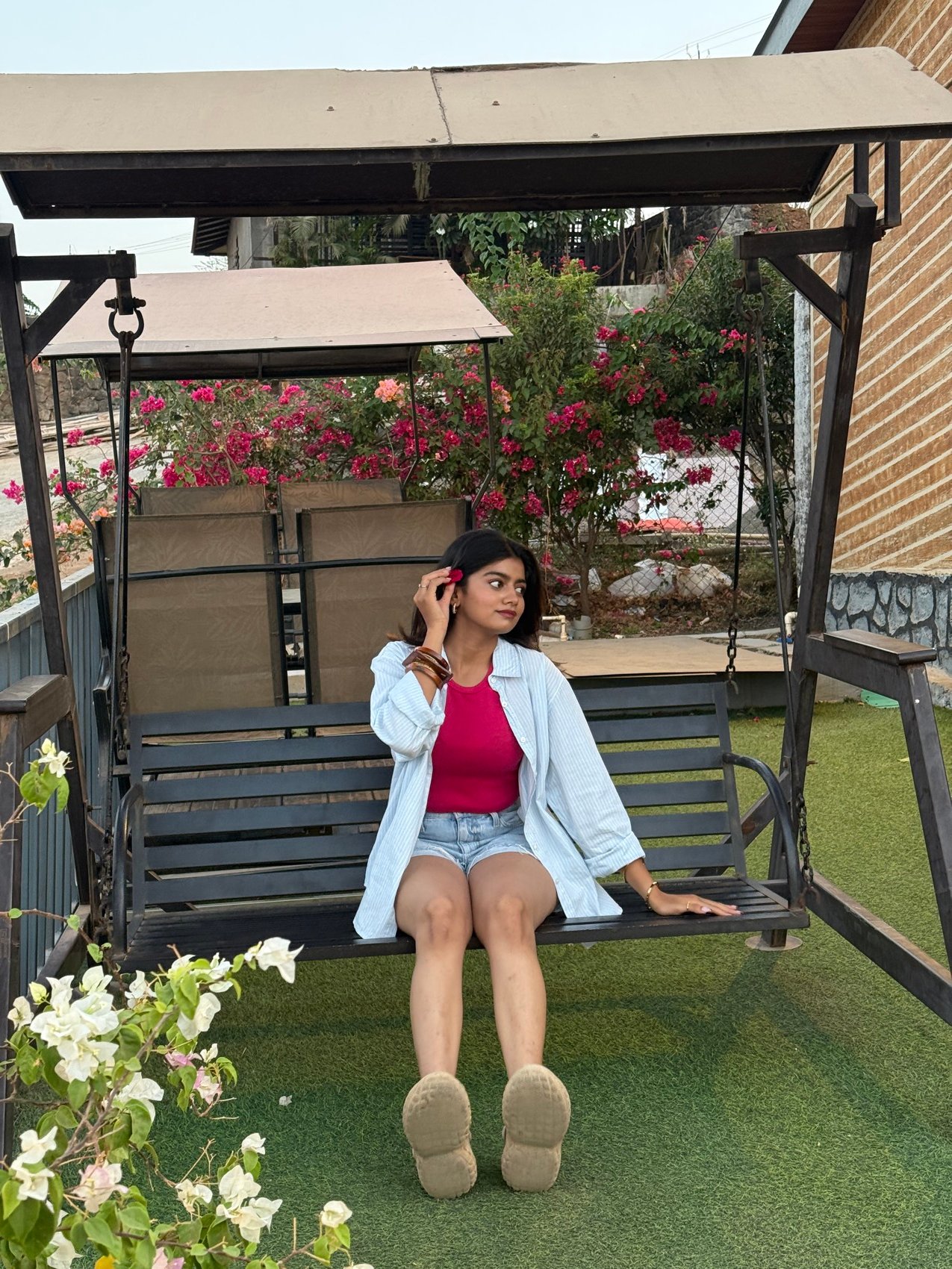 Garden swing shoot in denim and a white shirt